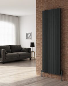 A tall sleek vertical radiator adds a touch of sophistication to a modern living room